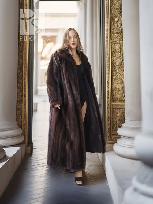 Full-length mahogany mink fur coat with open front and soft, textured fur.