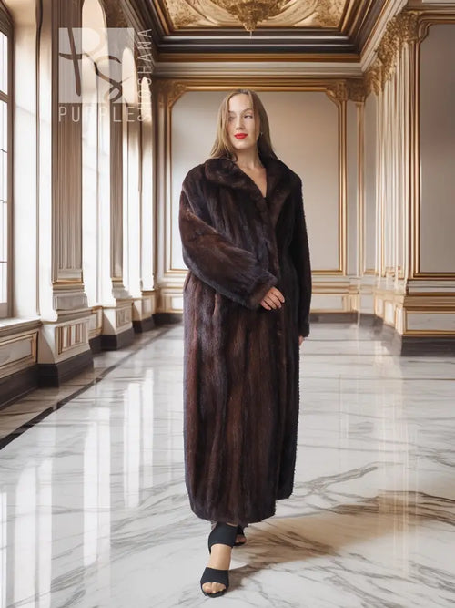 Long mahogany mink fur coat with open front and wide collar, full-length hem