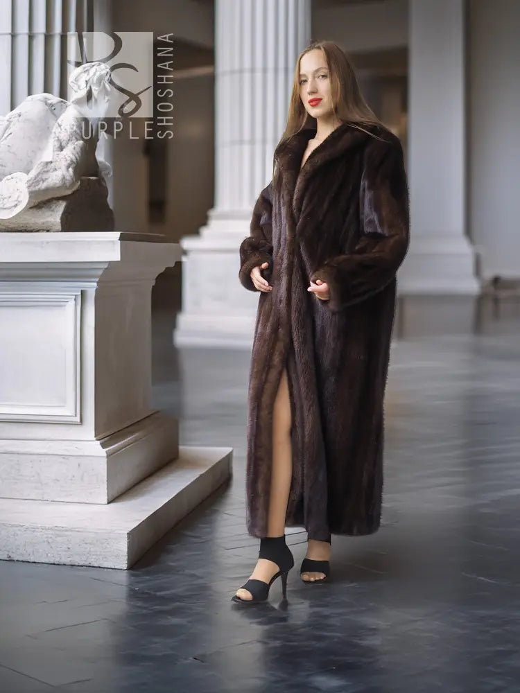Long mahogany mink fur coat with open wrap front and wide collar, side slit hem