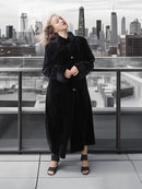 Reversible sheared mink coat in dark black with button-front and standing collar, front view.