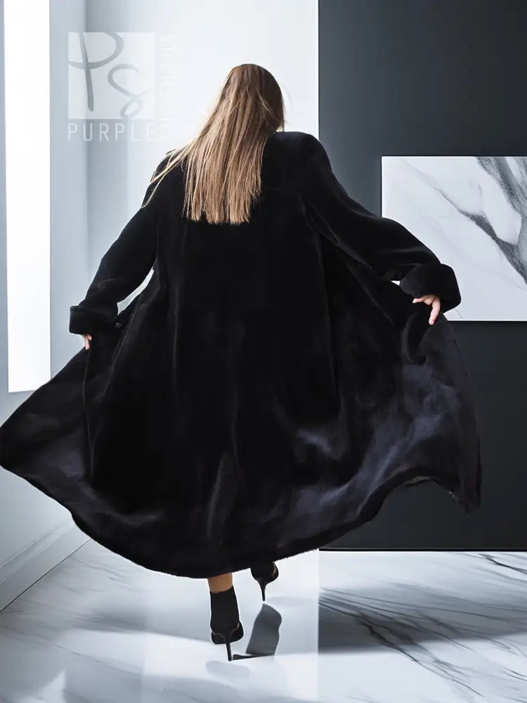 Black reversible sheared mink coat, flared long back with wide sleeves