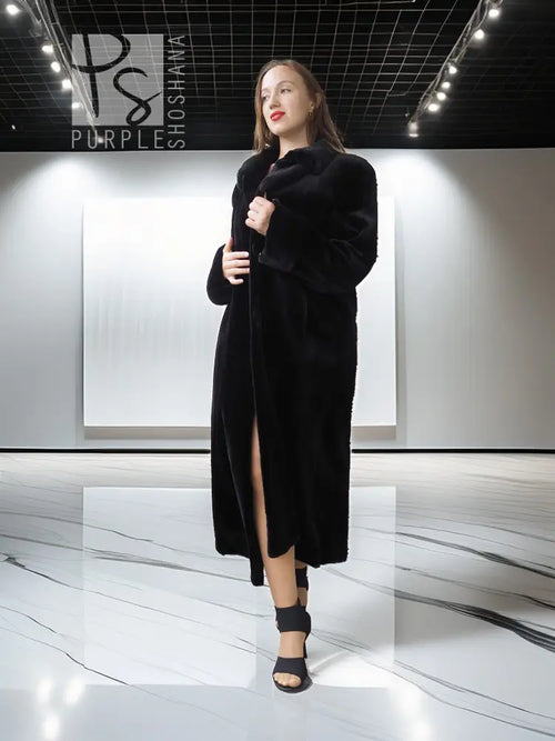 Reversible sheared mink coat in dark black with button-front, standing collar, front view.