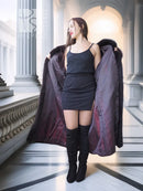 Long-haired beaver fur coat with fox trim, dark coat draped over shoulders