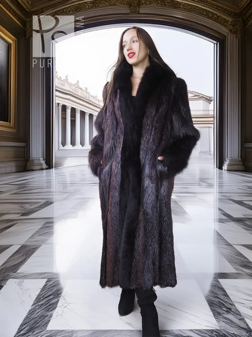 Long dark fur coat with wide collar and open front, plush cuffs over boots