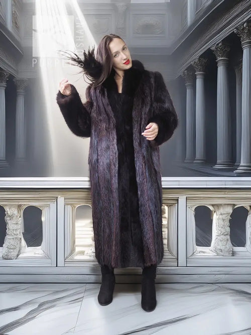 Long dark fur coat with thick collar and textured fur, worn with tall boots