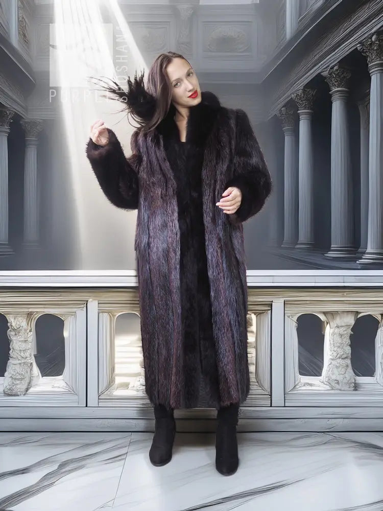 Long dark fur coat with thick collar and textured fur, worn with tall boots