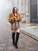 Short fur jacket in orange and grey plaid with wide collar, front view.