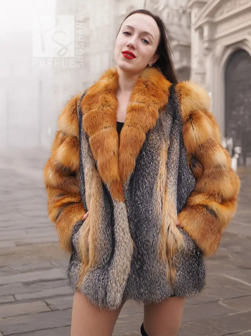 Fox-fur style jacket close-up with orange-brown fur collar and gray vertical center panels.