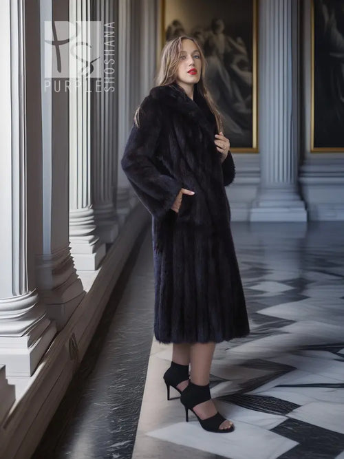 Black mink full-length coat with high collar, button front, and long sleeves.