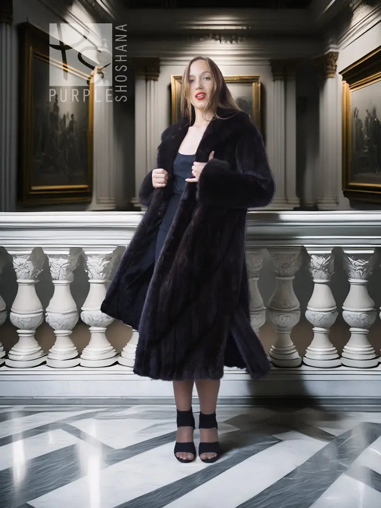Black mink full-length coat with open front, long sleeves, and side slits