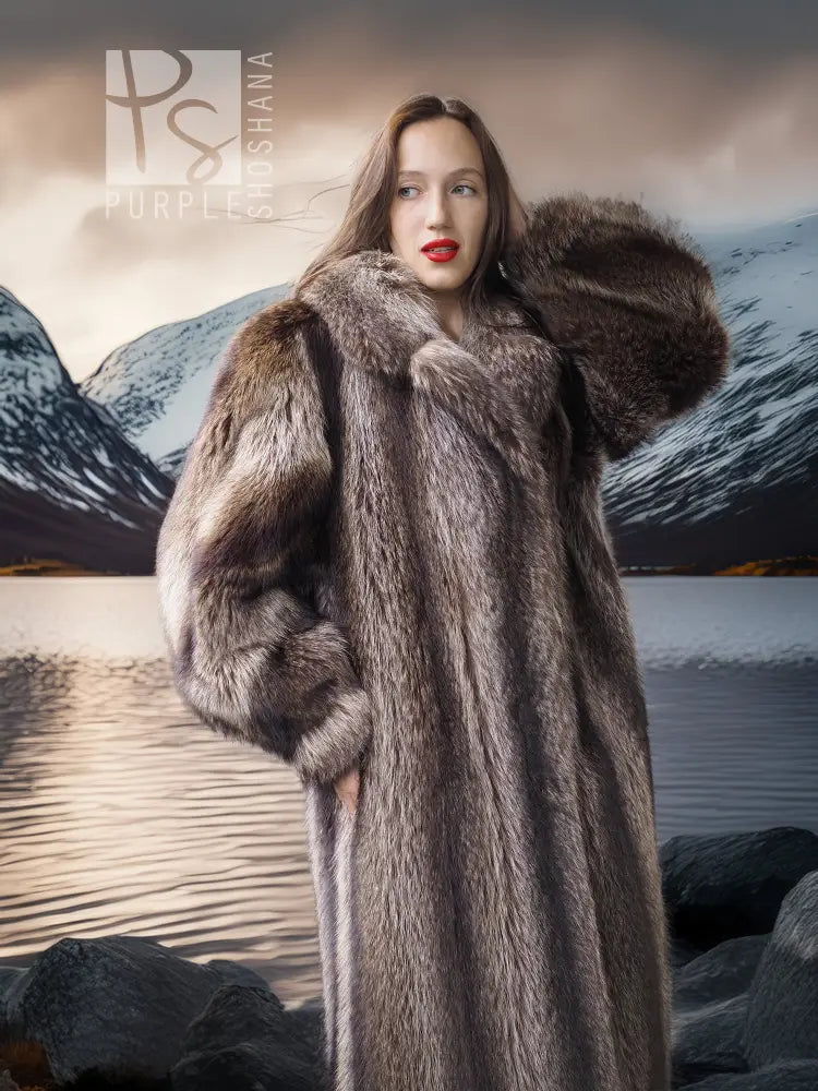 Full-length raccoon fur coat with voluminous shoulders, buttonless open front and plush cuffs.