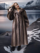 Taupe-brown raccoon fur coat with stand collar and long, straight silhouette.