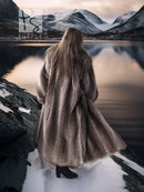 Back view of full-length raccoon fur coat with draped hooded collar and long sleeves.