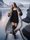 Full-length raccoon fur coat, long sleeves and open front with fluffy collar trim.