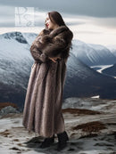 Full-length taupe-brown raccoon fur coat viewed from the back with wide collar.