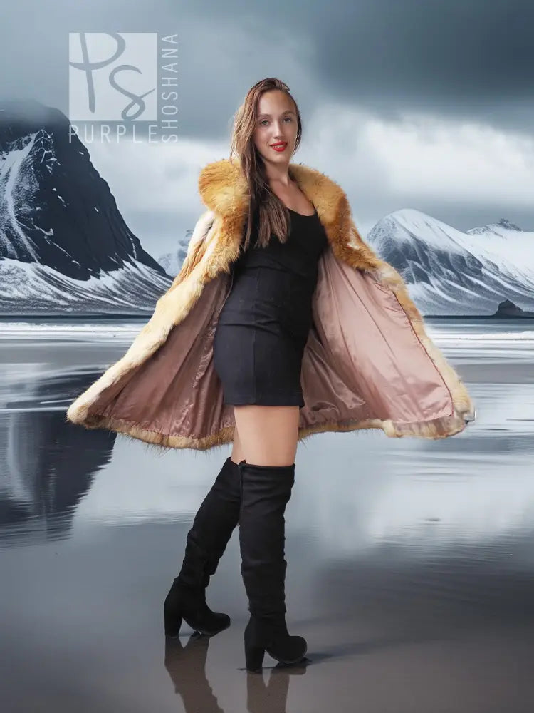 Tan shaggy fur hooded swing coat with open front and flared hem over a short black dress