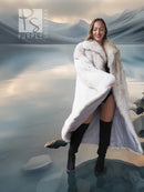 Light-colored fur coat with wide collar, draped front over tall black boots