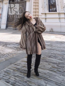 Mink fur jacket with herringbone chevron texture, long sleeves, open front