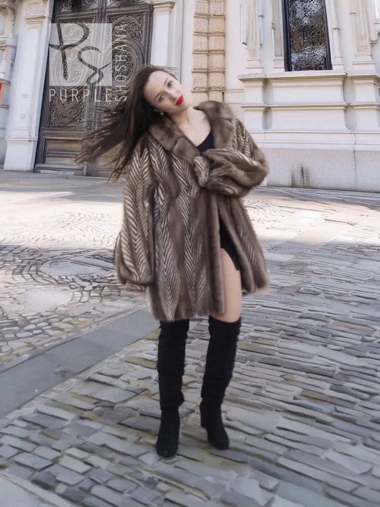 Mink fur jacket with herringbone chevron texture, long sleeves, open front