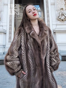 Brown mink jacket with herringbone pattern and thick fur collar detail