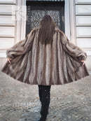 Back view of taupe-brown mink fur jacket with chevron herringbone pattern
