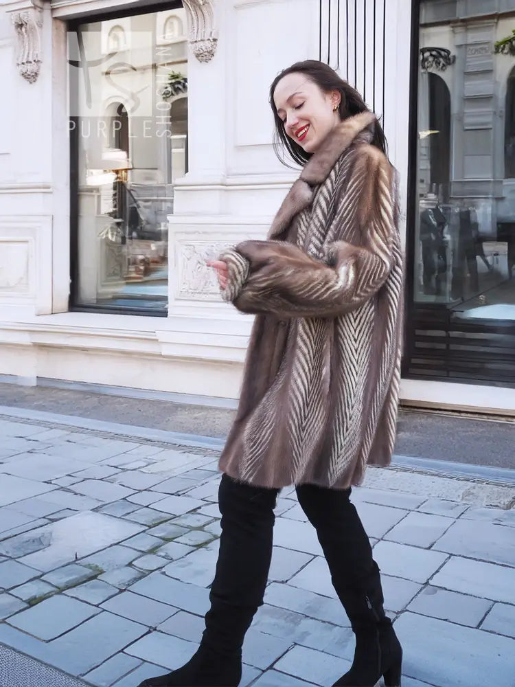 Mink fur jacket with chevron pattern and large collar, taupe-brown, arms crossed
