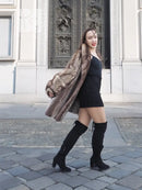 Brown mink fur jacket with herringbone texture and high fur-trimmed neckline