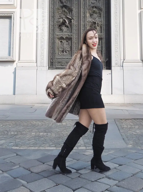 Brown mink fur jacket with herringbone texture and high fur-trimmed neckline