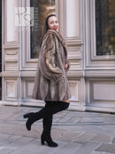 Brown mink fur jacket with diagonal herringbone pattern and high collar