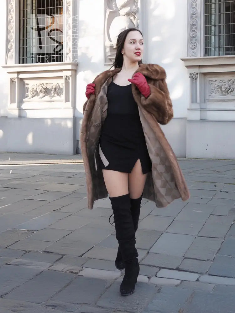 Brown mink fur coat with open collar and buttoned front, long sleeves
