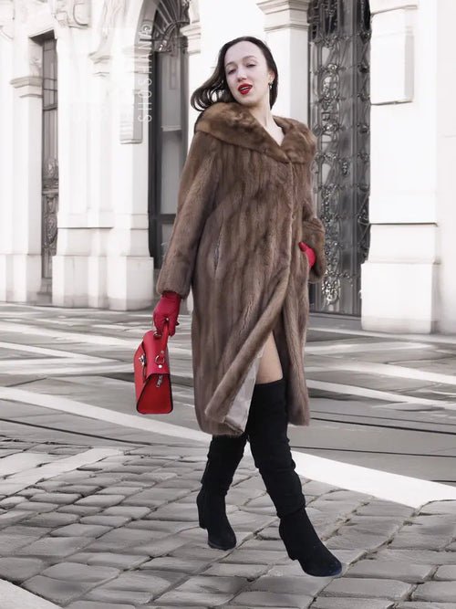 Brown vintage fur coat with hooded collar, long sleeves, side slit at hem