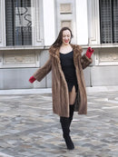 Brown mink fur coat with open front, wide collar, long sleeves and hip length