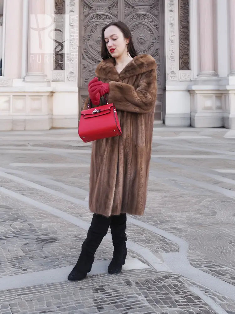 Brown long fur coat with hooded collar and straight, mid-calf length hem