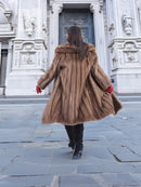 Hooded mink fur coat, back view, long sleeves, mid-calf length, taupe-brown