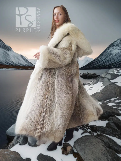 Full-length fur parka with fur-lined hood and wide mid-length collar, cream and tan.