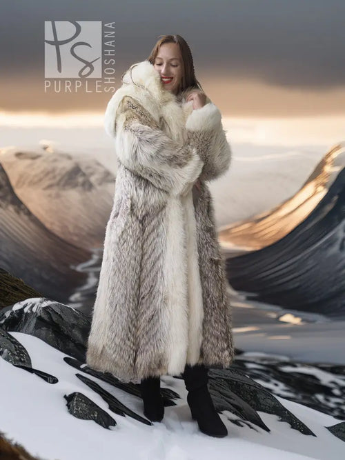 Full-length fur parka with large fur-lined hood and dark fur cuffs, winter styling.