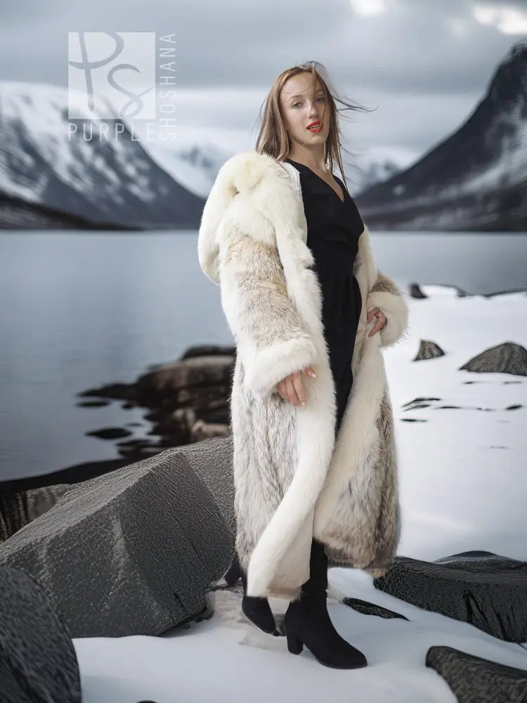 Full-length coyote parka with long sleeves, hood, and cream fur trim, side view.