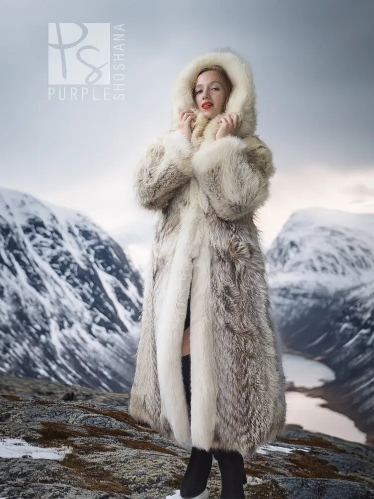 Long fur parka with fur-lined hood and front button closure, light beige