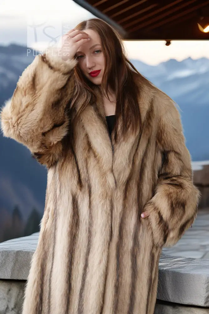Ivory raccoon fur coat, close-up front, plush hoodless collar and pocket seam