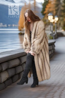 Ivory full-length raccoon coat, open front, long sleeves, side view