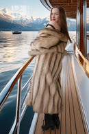 Ivory raccoon fur coat with wide collar, long length, front side view
