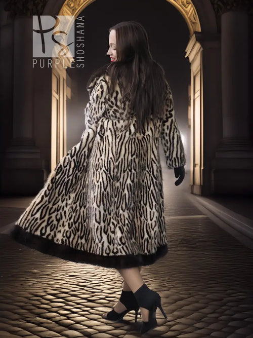 Stenciled mink coat with leopard pattern, long swing silhouette and black fur trim