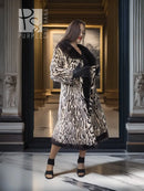 Stenciled mink coat with leopard print and black fur trim, full length front view