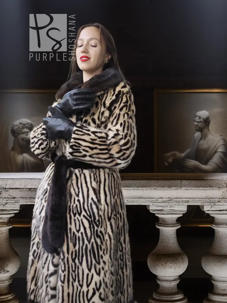 Stenciled mink coat with leopard pattern and black fur cuffs, belted waist