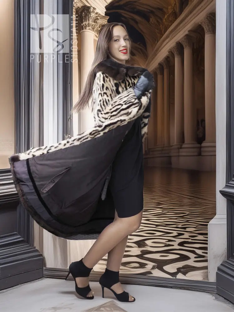 Stenciled mink coat with leopard pattern, black fur collar, draped side hem and belt