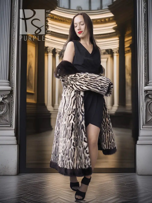 Stenciled mink coat with leopard pattern, black fur cuffs, worn over black dress