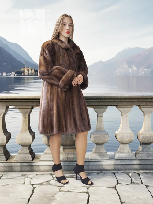 Dark brown mink swing coat with plush fur, wide collar, and short flared swing hem