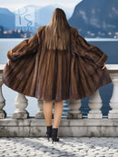 Dark brown mink swing coat back view with wide shoulders and flared swing hem
