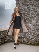 Tan-brown mink swing coat with open front and swing hem, walking pose.