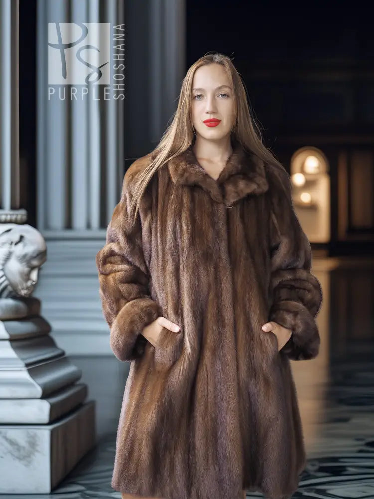 Brown mink swing coat with wide raised collar, front opening, and long sleeves